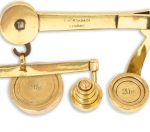 Brass Parcel Scales by S. Mordan with 7 Weights - click to enlarge.