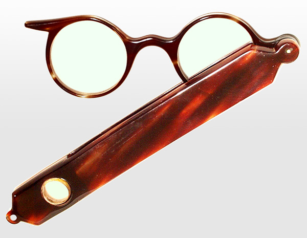 with Magnifying Glass in the handle. Lorgnettes were invented by George